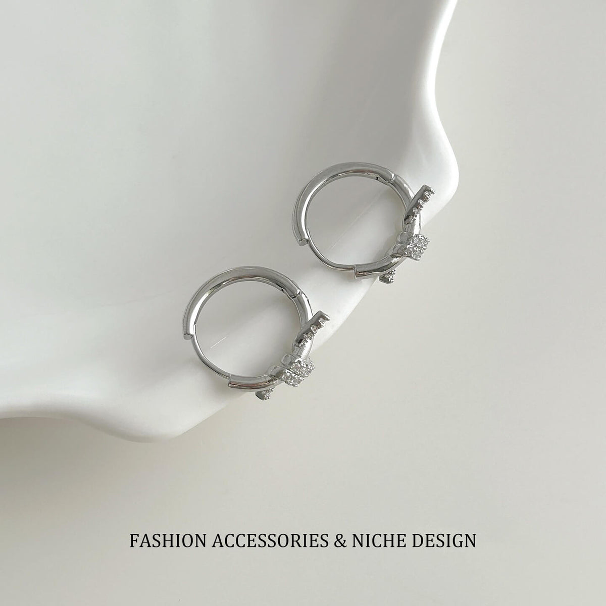 Pave CZ Knot Huggie Hoop Earrings