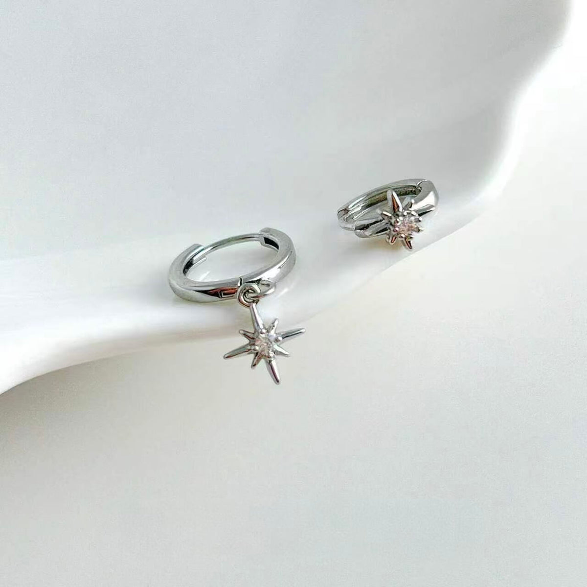 Asymmetric North Star CZ Dangle Huggie Earrings