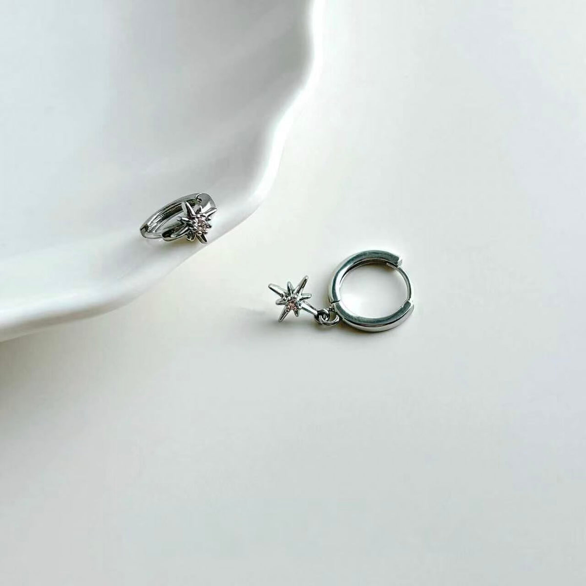 Asymmetric North Star CZ Dangle Huggie Earrings