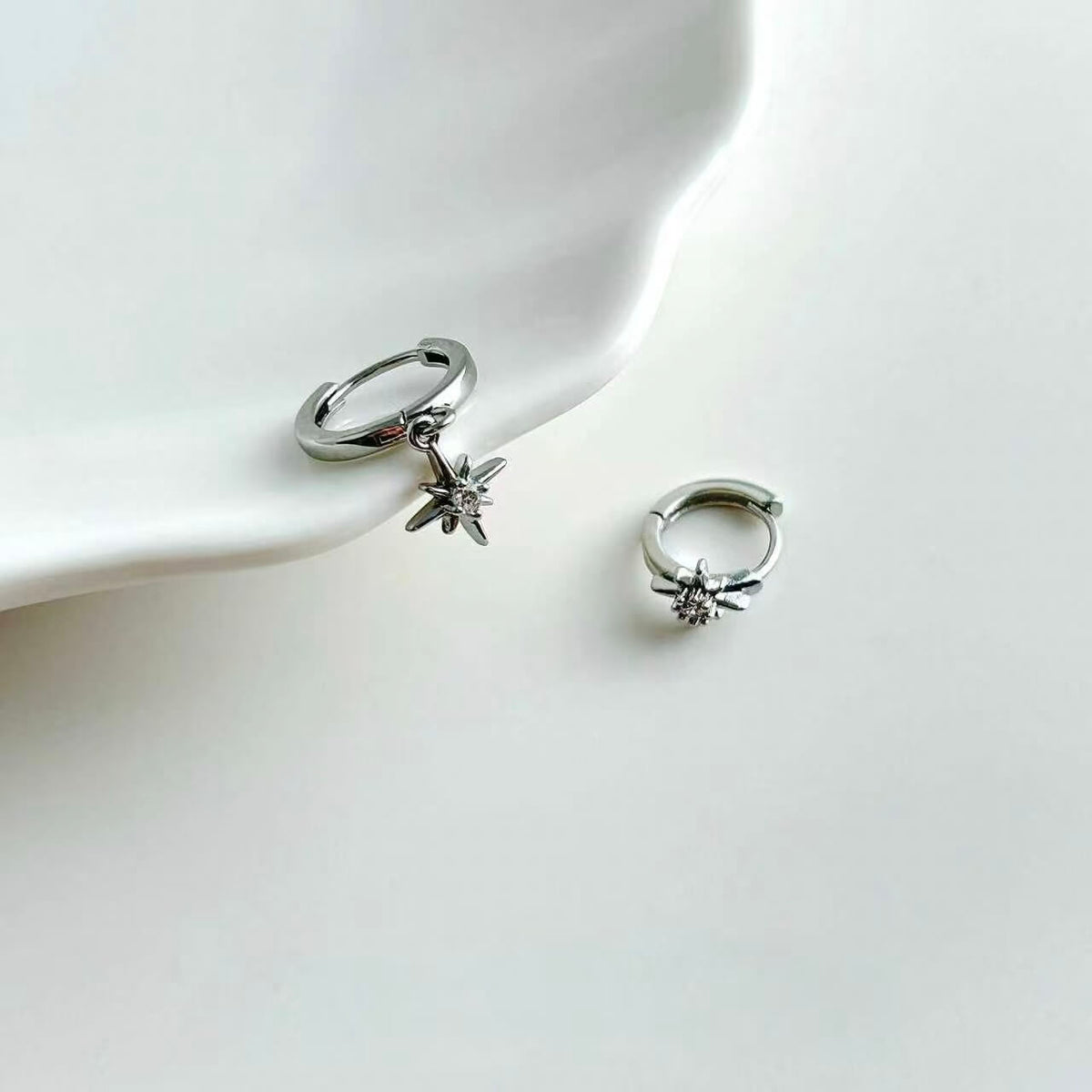 Asymmetric North Star CZ Dangle Huggie Earrings